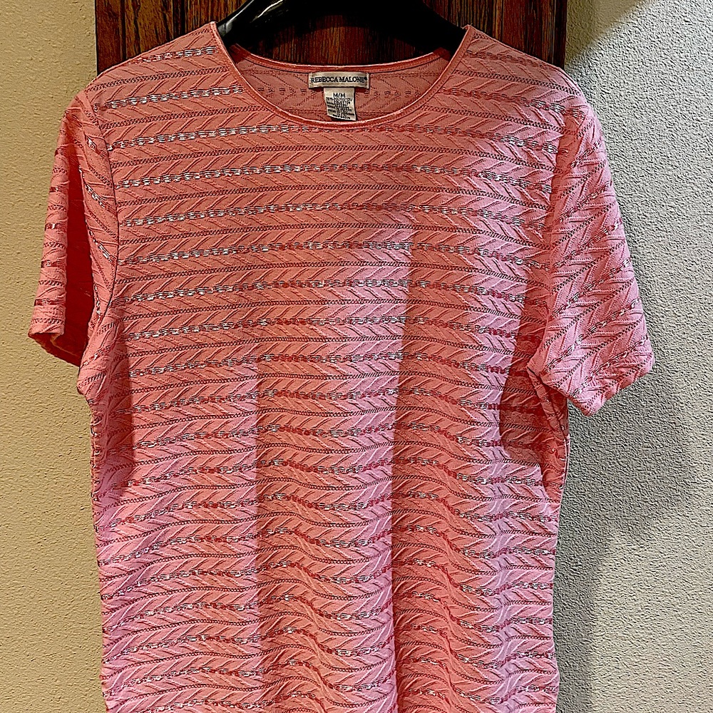 Two women’s tops and a cardigan